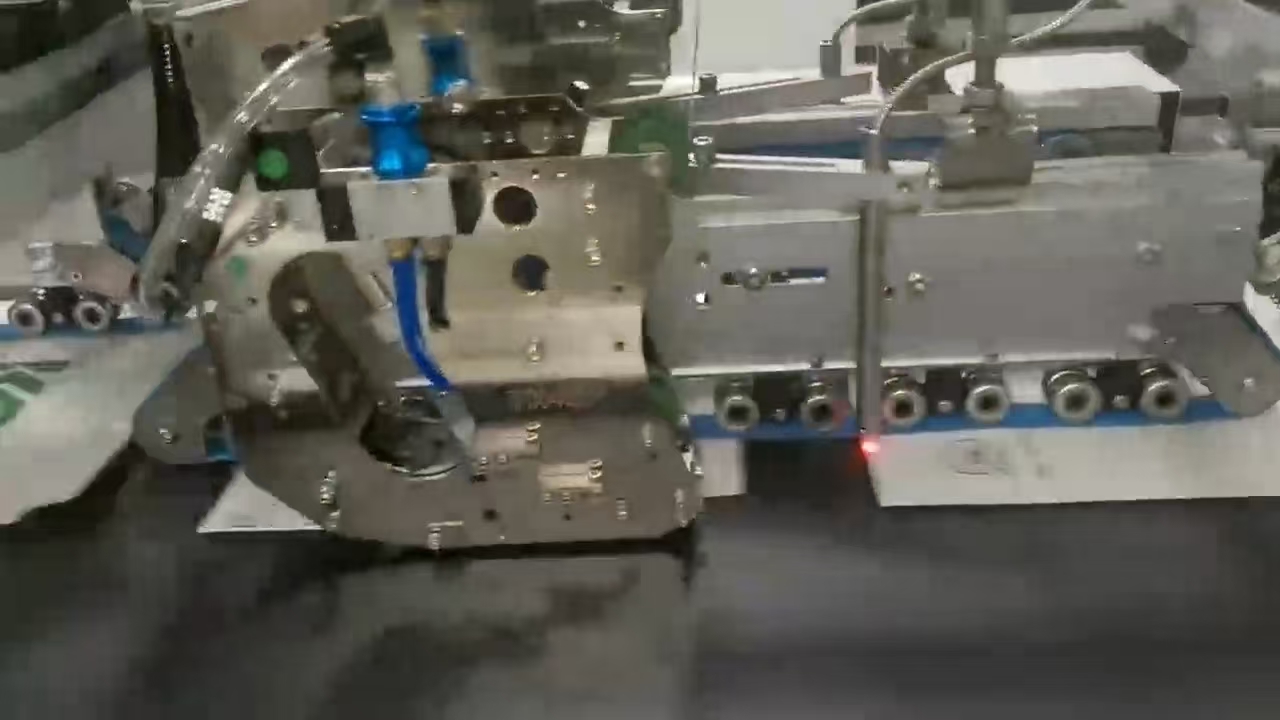 Automatic application of double-sided tape and labels on printed cartons