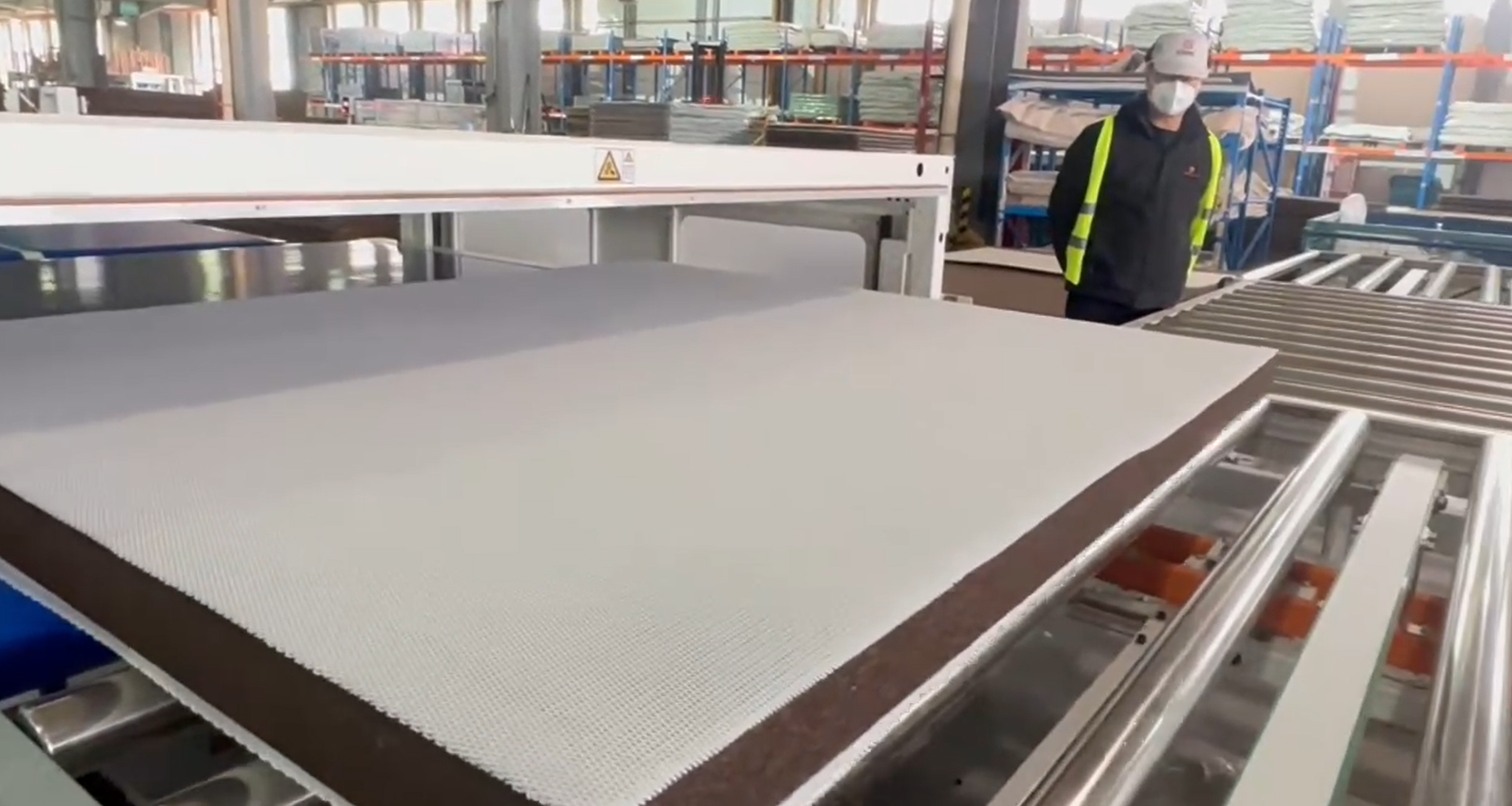 Finished bonded mattress panel after hot melt adhesive application