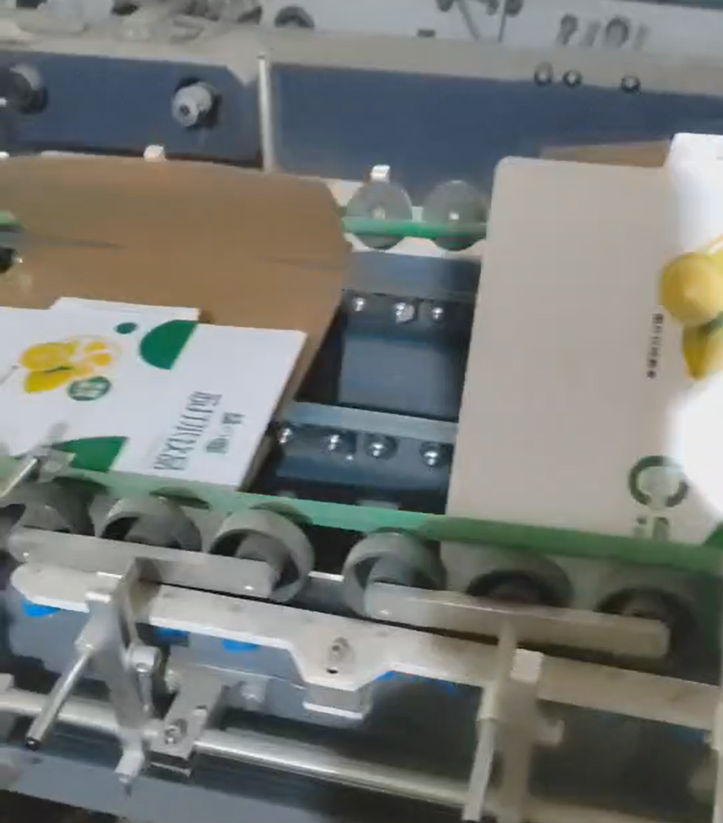 Wheel glue application after plasma treatment on food cartons